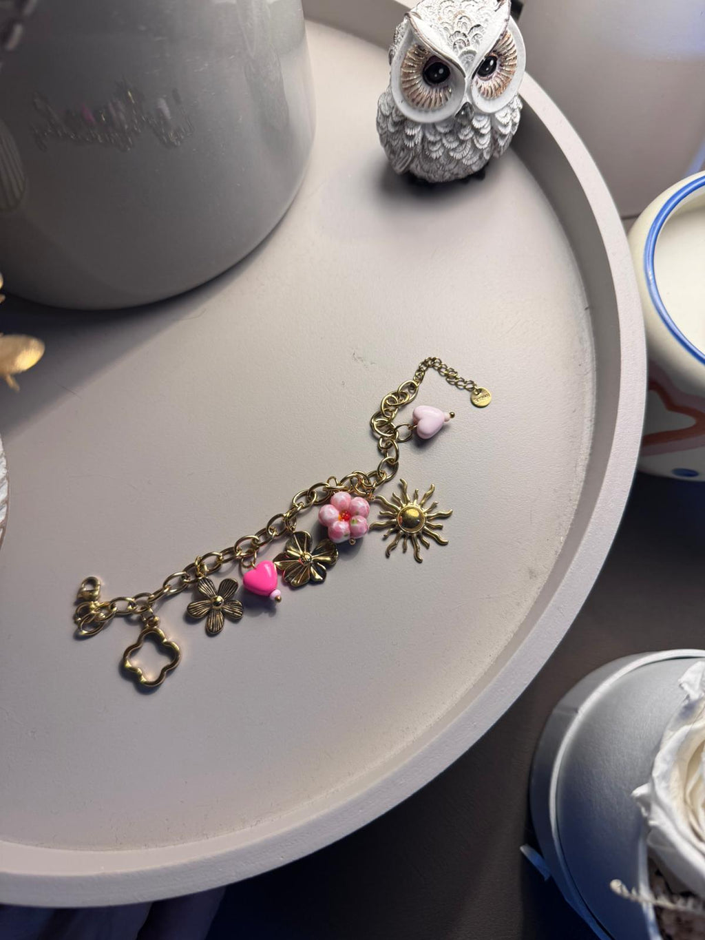 Bracelet doré fleurs coeur et soleil